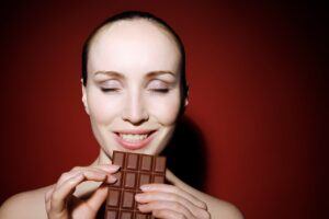 woman eating chocolate